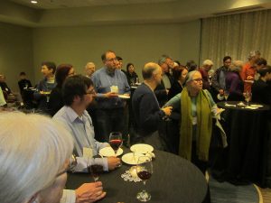 The MR Reviewer Reception. Mitch Keller, from the Mathematics Genealogy Project, is visible in the photo.
